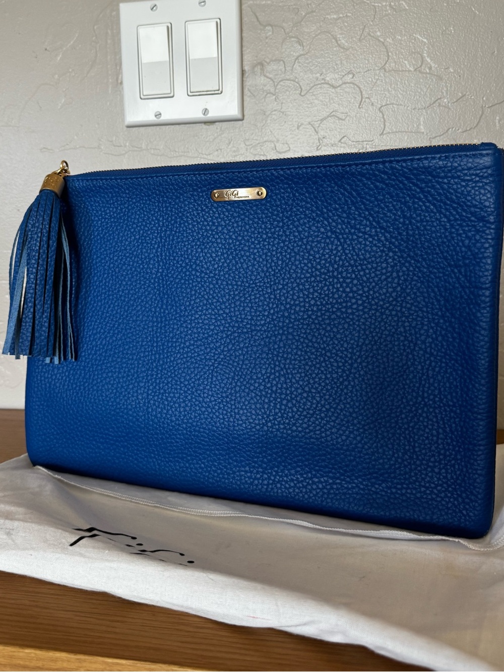 Gigi New York blue pebble leather Uber clutch